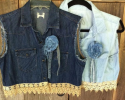 20225 Patsy Cropped Chambray Vest $85 has tea stained crochet trim and a removable fabric flower. It comes in sizes small - plus.